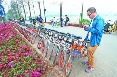 武汉人每天骑行百万次 共享单车将迎来“门槛”