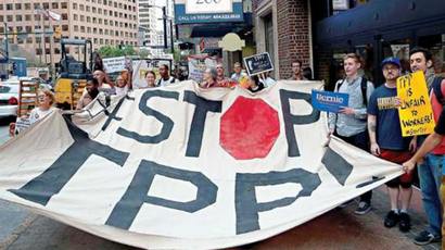 12国贸易部长签署TPP 当地民众街头抗议