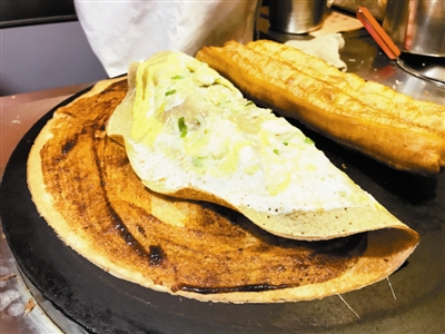 煎饼果子是天津人"小确幸" 津味名吃走向世界_央广网