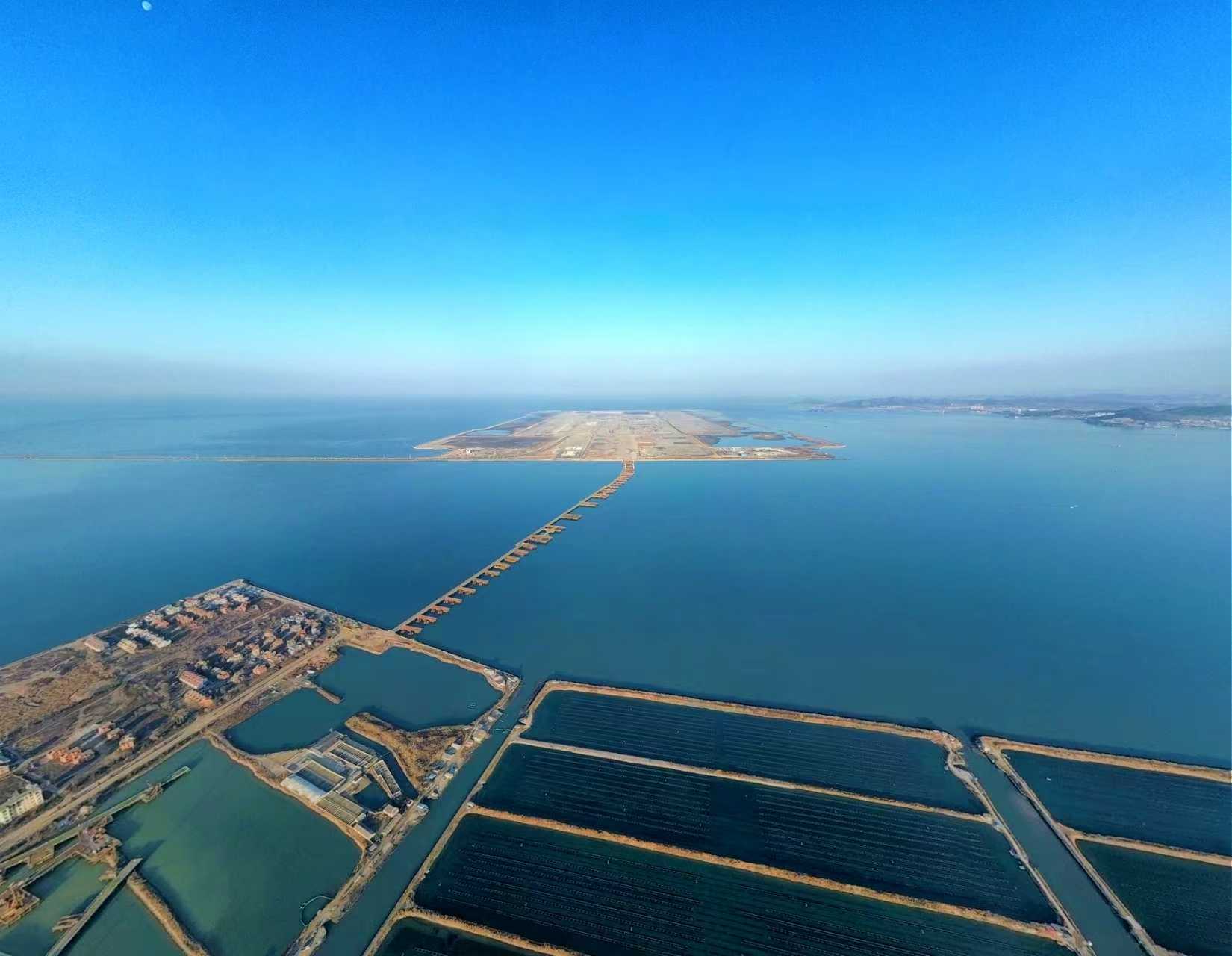 全国首个离岸式“人工岛”机场重点配套工程施工忙_央广网